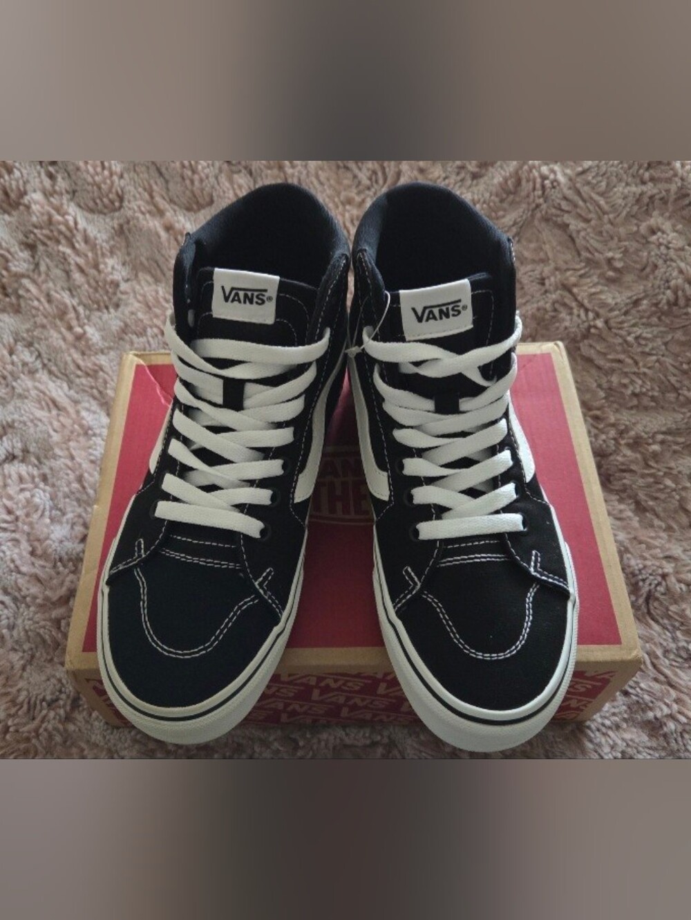 Vans Black and White High-Top Skate Sneakers